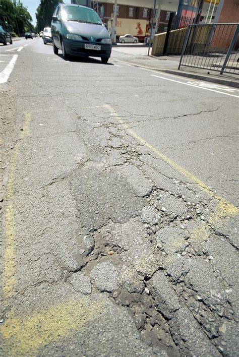 Damaged Road Surface Photograph By Trl Ltdscience Photo Library