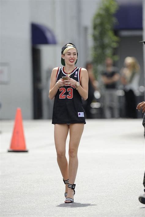Miley Cyrus In A Basketball Shirt And No Pants Outside Centerstaging