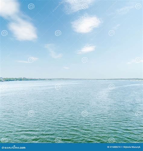 Blue River And Sky With White Clouds Stock Photo Image Of Rural