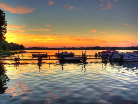 Black Lake Sunrise The Sun Begins To Rise On This Small Marina At