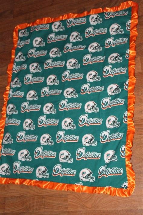 Miami dolphins home decor is stocked at fanatics. Miami Dolphins Blanket. $37.00, via Etsy. | Miami dolphins ...