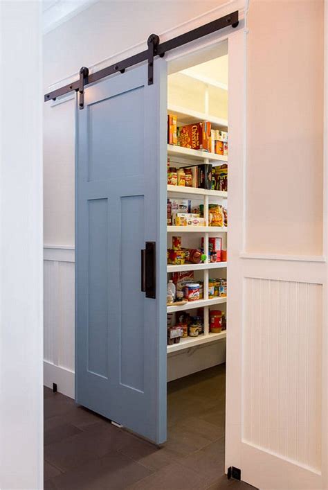 Mid century modern wall unit design. Silver Fox Valspar. Blue barn door paint color is Silver Fox Valspar #SilverFoxValspar BAC ...