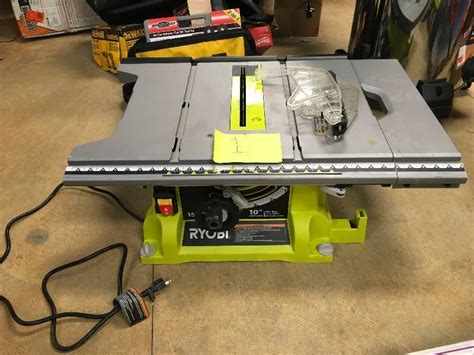 Ryobi 10 In Portable Table Saw With Quick Stand Used In Working