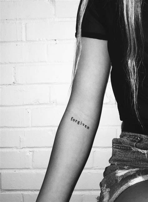 A Woman S Arm With The Word Forever Tattooed On Her Left Forearm And Wrist