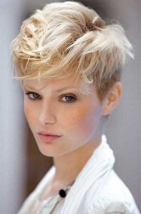 Modern pompadour with high fade. Long on top pixie