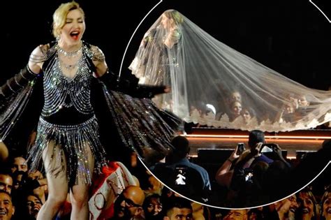 Madonna Shocks As She Pulls Down A Female Fan S Top To Reveal Her Bare