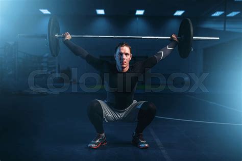 Strength Athlete On Training Workout With Barbell Stock Image