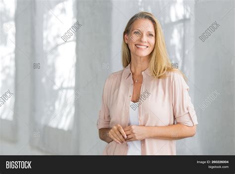 cheerful mature woman image and photo free trial bigstock