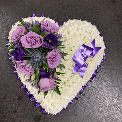 Purple Lilac And White Heart Shaped Funeral Wreath Flowers Tribute With