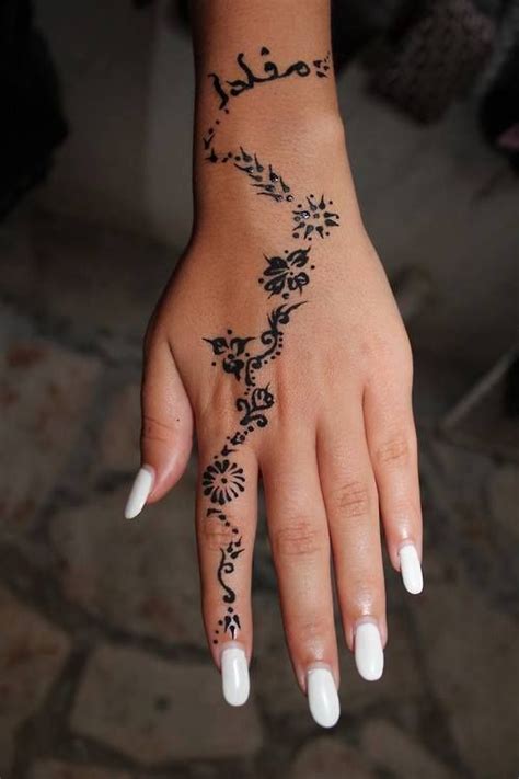 Picture Of A Floral Pattern On A Hand And Finger