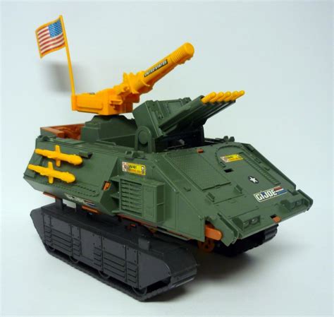 Joe tank or fiercely displaying their joe equipment while a chorus of deep, male voices sang (to the tune of the caissons go rolling along) g.i. GI JOE FORT AMERICA Vintage 12" Action Figure Vehicle Tank ...