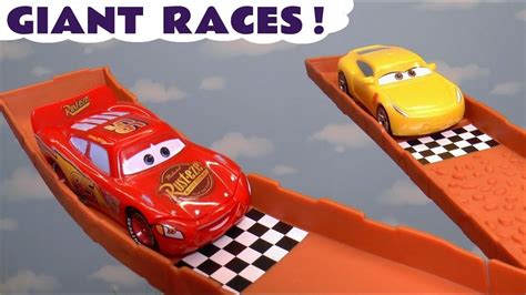 cars mcqueen giant race with cruz and the hot wheels superhero cars tt4u cars mcqueen disney