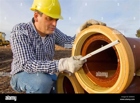 Construction Workers Craftsmen Pipe Work Check Work Job