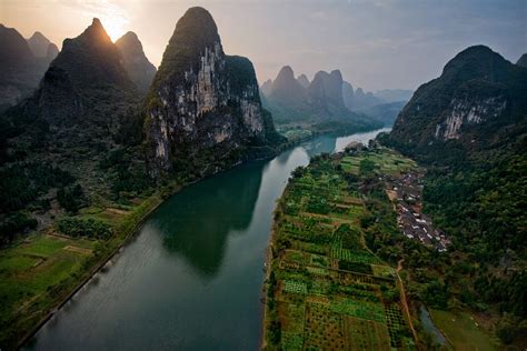 Most commonly, rivers flow on the surface of the land, but there are also many examples of underground rivers, where the flow is contained within chambers, caves, or caverns. Li River, China | In Guangxi, limestone pinnacles line the ...