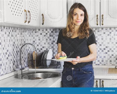 Housewife In The Kitchen Stock Image Image Of Dishes 132661453