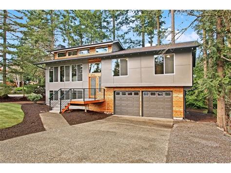 Deck house renovation in chapel hill, north carolina. Flipping Houses Boring Split Level Transformed Into Modern ...