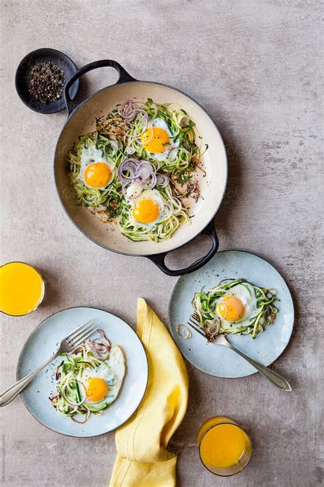 Spiralized Zucchini Nests With Eggs By Stocksy Contributor Nadine