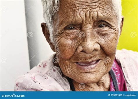 Close Up Portrait Of An Old Filipino Woman With Wrinkled Skin Editorial Photo Cartoondealer
