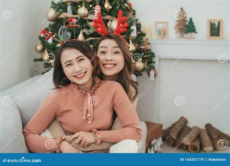 A Couple Of Two Lesbians Are Happy To Celebrate Christmas And New Year Stock Image Image Of