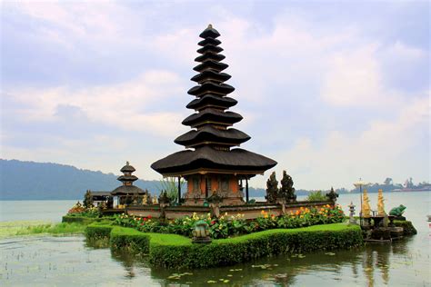 The balinese jungle gives way to cloudy rocks as your driver propels you further into the sky. Bali - Pura Ulun Danu Bratan | Pura Ulun Danu Bratan, or ...