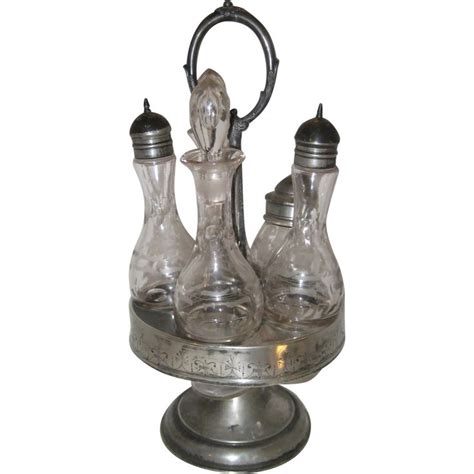 victorian silverplate castor or cruet set with five bottles cruet silver plate bottle