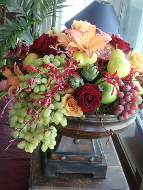 Absence of some parts (incomplete flowers). Fruit and Flower Arrangements as Centerpieces - Sortrachen