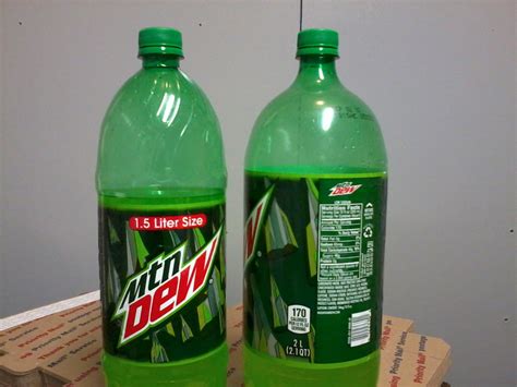 The 1.5 and 2 liter bottles of Mountain Dew are the same height ...