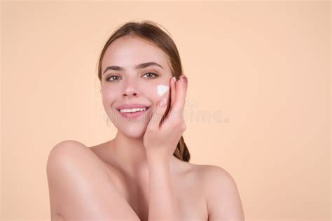 Closeup Young Woman Applying Cream To Face Skincare And Cosmetics
