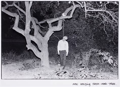 Man Hanging From Crab Tree International Center Of Photography