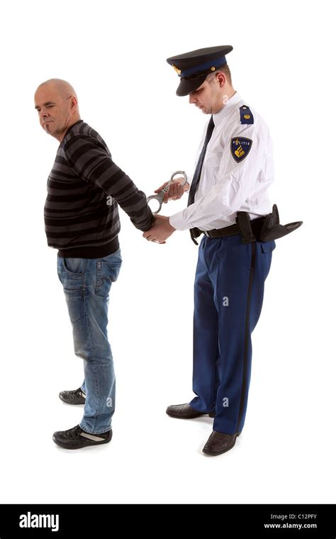 Police Agent Is Making A Arrest Over White Background Stock Photo Alamy