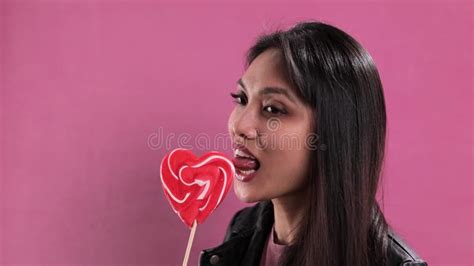 woman licks her lips close up gentle female tongue licks beautiful white teeth stock footage