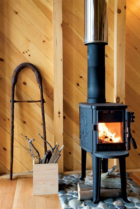 A Tiny Cabin Is This Writers Off The Grid Getaway Small Wood Burning Stove Tiny Wood Stove