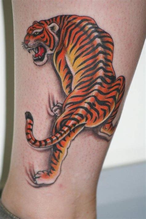 This inked beast conveys masculinity, power, and controlled aggression. Wild Tattoos: Tiger tattoos for men