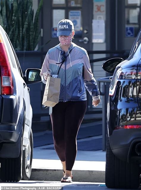 Katy Perry Picks Up Some Take Out Food In Tracksuit Top And Legging In