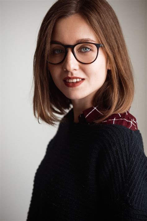 Free Photo Blue Eyed Woman With Short Hair In Glasses
