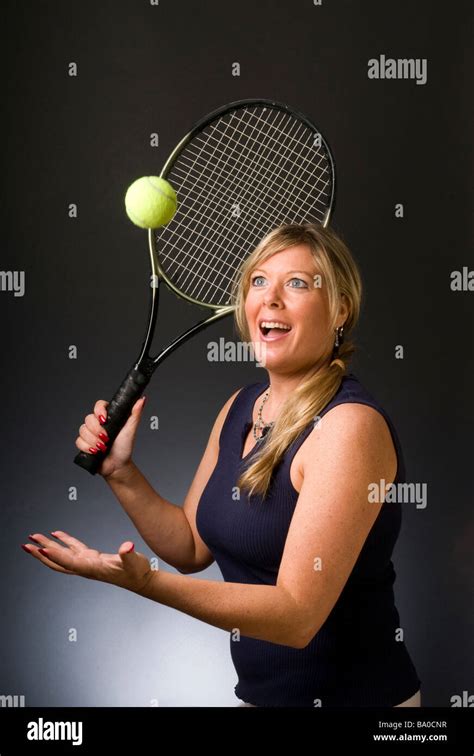 Happy Smiling Female Tennis Player With Racquet And Ball Healthy