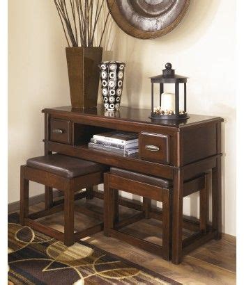 Have something a little grander in mind? Ashley Furniture Lance Console Table with Stools in Medium ...