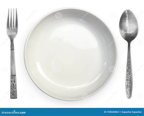 Empty Plate With Spoon And Fork On A White Background Stock Photo