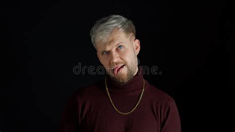 Comical Stupid Stylish Man Making Funny Silly Face Grimace Playing