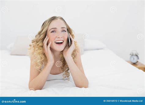 Pretty Cheerful Blonde Lying On Bed Phoning Stock Image Image Of