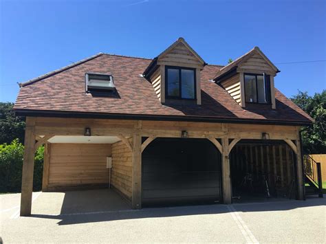 Carport kits provide a portable garage that can even double up like a tent where you can gather with family and friends while enjoying the outdoors. Oak Framed Garages - Oaksmiths