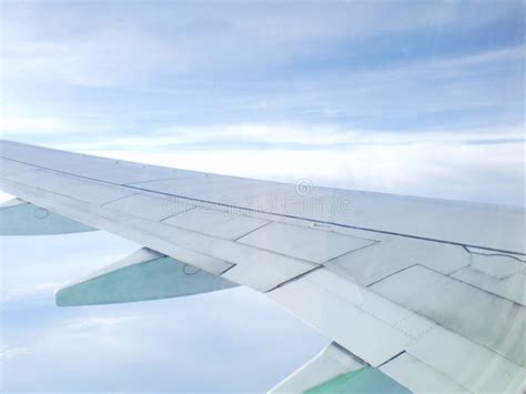 Clouds And Sky As Seen Through Window Of An Aircraft Stock Image