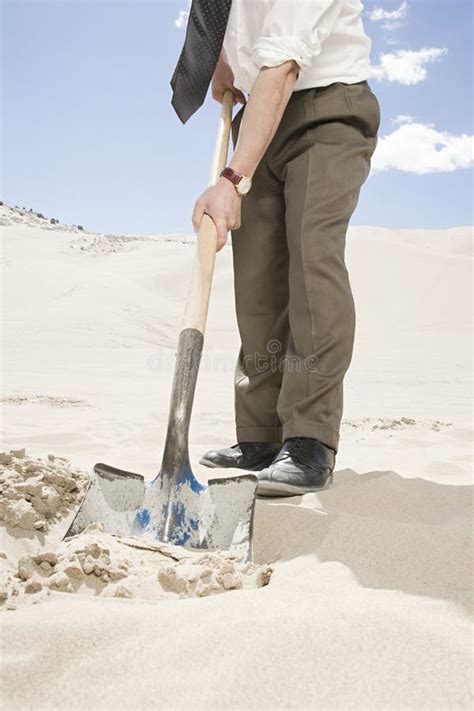 Man Digging In Desert Stock Photo Image Of Nature Formal 62807714