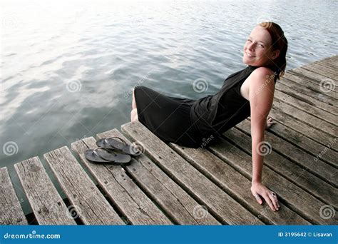 Young Woman Relaxing At Lake Stock Photography Image 3195642