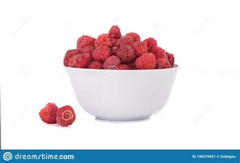 Pile Of Fresh Raspberries In White Bowl Isolated On White Background
