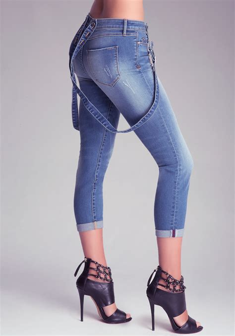 Bebe Cuffed Suspender Jeans In Blue Lyst