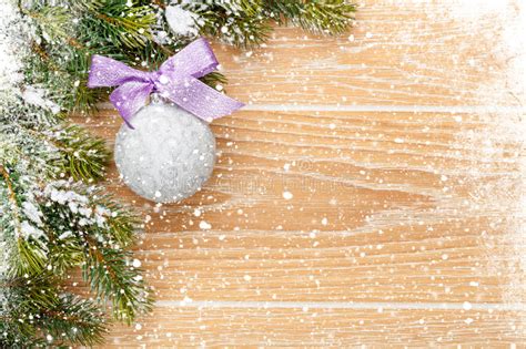 Christmas Wooden Background With Snow Fir Tree And Decor Stock Image