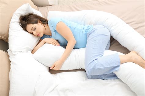 Young Pregnant Woman Sleeping On Maternity Pillow At Home The Pulse