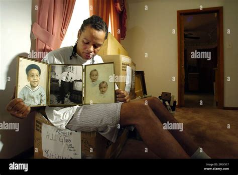 Abriel Thomas A Cousin Of Emmett Till Holds A Triptych Showing