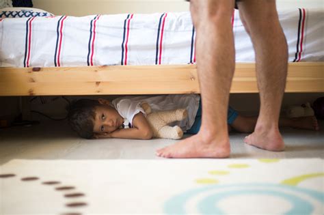 Hiding Under A Bed Stock Photo Download Image Now Istock